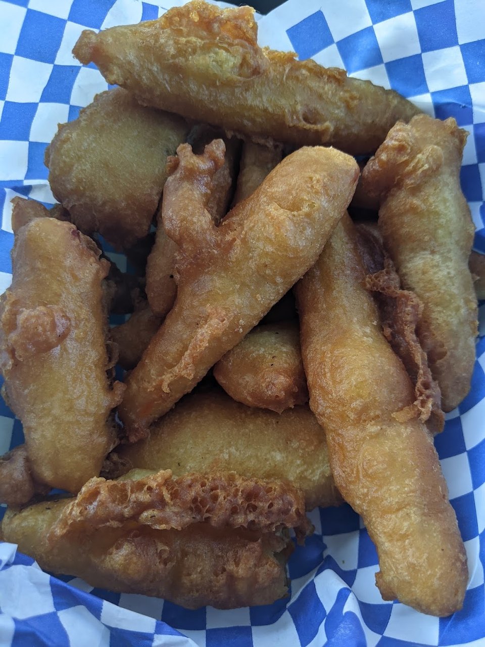 Food menu with fish and chips options.